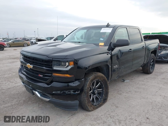 2017 Chevrolet Silverado 1500 LT with VIN 1GCUKREC2HF208232, listed as a IAAI auction lot 40933445 with 105,928 mi miles and . Bid and sale history available at DreamBid. Image 17.