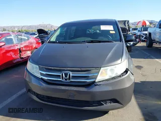 2011 Honda Odyssey EX-L with VIN 5FNRL5H6XBB083980, listed as a IAAI auction lot 42100308 with 191,361 mi miles and . Bid and sale history available at carsss.com. Image 12.