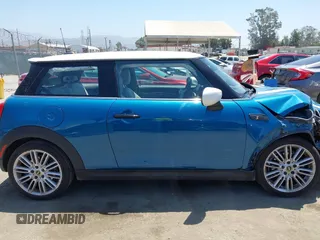 2023 MINI Hardtop Cooper SE with VIN WMW13DJ07P2S73739, listed as a IAAI auction lot 42542088 with 16,344 mi miles and . Bid and sale history available at DreamBid. Image 13.