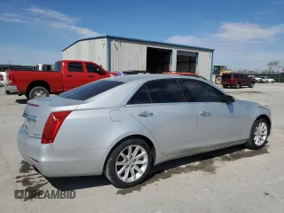 2014 Cadillac CTS Luxury RWD z VIN 1G6AR5SX0E0134728, wystawiony jako Copart lot #50812825 z przebiegiem 52 573 mil mil oraz Szkoda całkowita • Salvage title. Historia ofert i sprzedaży dostępna na DreamBid. Obrazek 3.
