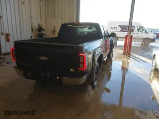 2010 Chevrolet Silverado 1500 LT with VIN 1GCSKSE31AZ155171, listed as a IAAI auction lot 41619404 with 209,422 mi miles. Bid and sale history available at carsss.com. Image 4.