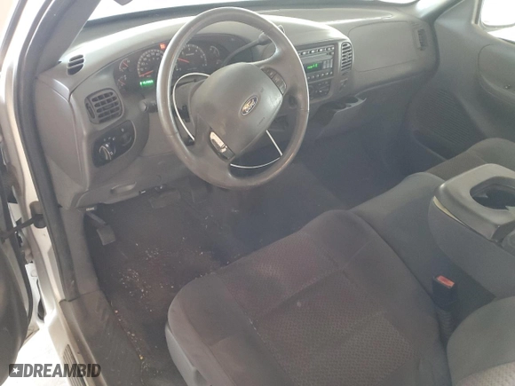 2003 Ford F-150 XL with VIN 1FTRX07233KD43811, listed as a Copart auction lot 85113414 with 215,390 mi miles and Salvage Title. Bid and sale history available at carsss.com. Image 8.