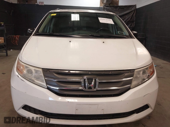 2013 Honda Odyssey EX-L with VIN 5FNRL5H66DB071151, listed as a IAAI auction lot 41914345 with 194,804 mi miles and . Bid and sale history available at carsss.com. Image 12.
