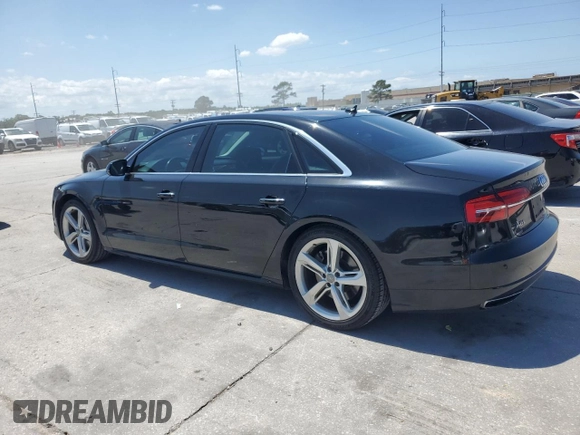 2018 Audi A8 z VIN WAU44AFD0JN000880, wystawiony jako Copart lot #54751235 z przebiegiem 76 161 mil mil oraz Szkody całkowita. Historia ofert i sprzedaży dostępna na DreamBid. Obrazek 2.