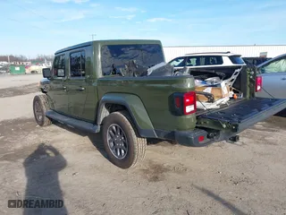 2023 Jeep Gladiator Overland with VIN 1C6HJTFG9PL507484, listed as a IAAI auction lot 41486457 with 54,871 mi miles. Bid and sale history available at carsss.com. Image 3.