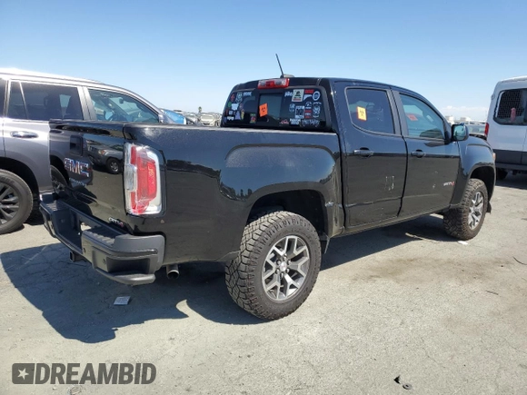 2021 GMC Canyon 4WD AT4 w/Cloth with VIN 1GTG6FEN4M1268263, listed as a Copart auction lot 72393764 with 42,249 mi miles and Salvage Title. Bid and sale history available at carsss.com. Image 3.