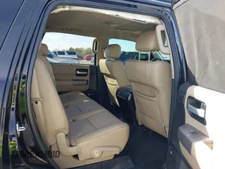 2014 Toyota Sequoia Limited with VIN 5TDKY5G13ES055656, listed as a IAAI auction lot 41616322 with 118,859 mi miles. Bid and sale history available at carsss.com. Image 8.