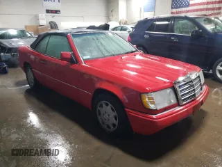 1994 Mercedes-Benz E 320 with VIN WDBEA66E8RC044069, listed as a Copart auction lot 87713565 with 69,061 mi miles and Salvage Title. Bid and sale history available at DreamBid. Image 4.