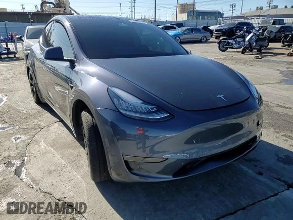 2023 Tesla Model Y Long Range with VIN 7SAYGDEE2PA047794, listed as a Copart auction lot 48397305 with 18,850 mi miles and Salvage Title. Bid and sale history available at DreamBid. Image 12.