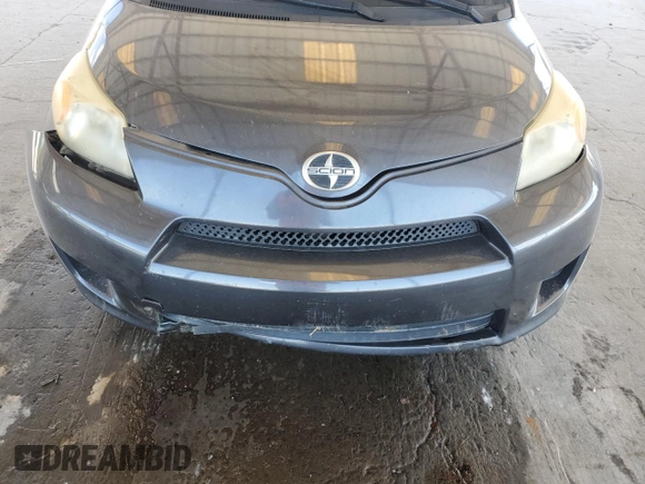 2009 Scion xD z VIN JTKKU10419J046166, wystawiony jako Copart lot #56123435 z przebiegiem 184 030 mil mil oraz Szkoda całkowita • Salvage title. Historia ofert i sprzedaży dostępna na DreamBid. Obrazek 11.