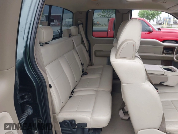 2004 Ford F-150 XL with VIN 1FTPX12504NB98290, listed as a IAAI auction lot 42020146 with 85,279 mi miles. Bid and sale history available at carsss.com. Image 8.
