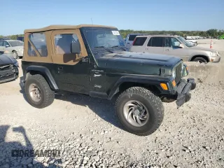 1998 Jeep Wrangler Sport with VIN 1J4FY19S0WP709843, listed as a Copart auction lot 74312254 with 147,010 mi miles and Salvage Title. Bid and sale history available at carsss.com. Image 4.