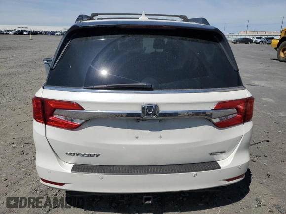 2018 Honda Odyssey Touring with VIN 5FNRL6H8XJB018438, listed as a Copart auction lot 61876505 with 104,581 mi miles and Salvage title. Bid and sale history available at DreamBid. Image 6.