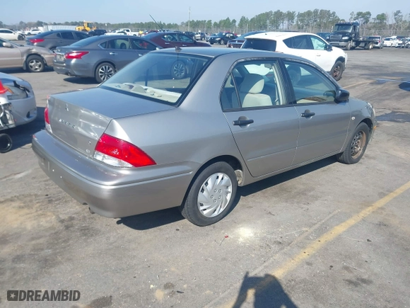2003 Mitsubishi Lancer ES with VIN JA3AJ26E63U007501, listed as a IAAI auction lot 41771016 with 146,984 mi miles. Bid and sale history available at carsss.com. Image 4.