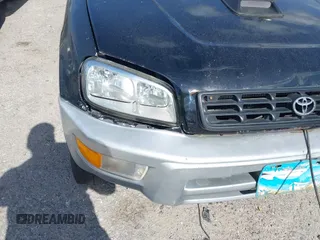 1998 Toyota RAV4 with VIN JT3GP10V7W7037711, listed as a IAAI auction lot 42081313 with 233,554 mi miles and . Bid and sale history available at DreamBid. Image 12.