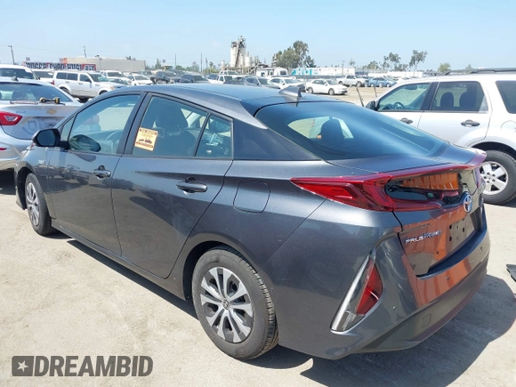 2021 Toyota Prius LE with VIN JTDKAMFP3M3167586, listed as a IAAI auction lot 39672661 with 42,050 mi miles and . Bid and sale history available at DreamBid. Image 3.