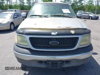 2002 Ford F-150 XL with VIN 1FTRX17W22NA55784, listed as a IAAI auction lot 41958686 with 278,064 mi miles. Bid and sale history available at carsss.com. Image 6.