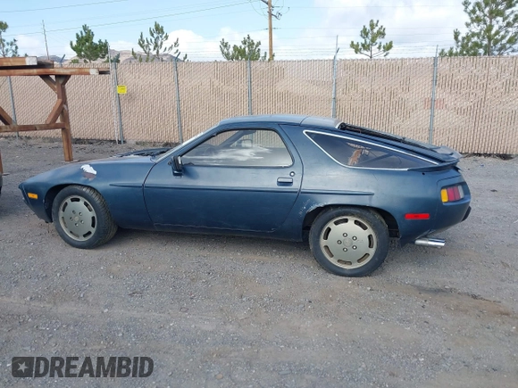 1982 Porsche 928 z VIN WP0JA0926CS821506, wystawiony jako IAAI lot #41903954 z przebiegiem 64 814 mil mil oraz . Historia ofert i sprzedaży dostępna na DreamBid. Obrazek 14.
