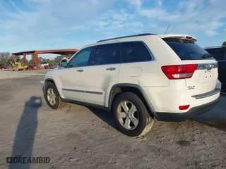 2011 Jeep Grand Cherokee Limited with VIN 1J4RR5GG0BC668910, listed as a IAAI auction lot 41353138 with 74,388 mi miles. Bid and sale history available at carsss.com. Image 3.
