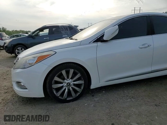 2014 Hyundai Azera Limited z VIN KMHFH4JG3EA352749, wystawiony jako Copart lot #55457525 z przebiegiem Nie podano mil oraz Szkoda całkowita • Salvage title. Historia ofert i sprzedaży dostępna na DreamBid. Obrazek 13.