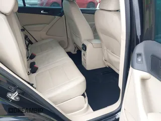 2014 Volkswagen Tiguan SE z VIN WVGAV3AXXEW535128, wystawiony jako IAAI lot #41882213 z przebiegiem 103 161 mil mil oraz . Historia ofert i sprzedaży dostępna na DreamBid. Obrazek 8.