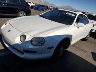 1995 Toyota Celica ST with VIN JT2AT00F9S0049936, listed as a Copart auction lot 43020895 with 208,405 mi miles and Salvage Title. Bid and sale history available at carsss.com. Image 1.