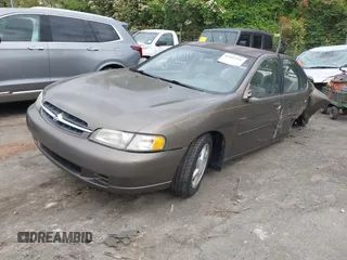 1999 Nissan Altima XE with VIN 1N4DL01D2XC150751, listed as a IAAI auction lot 42042391 with 258,949 mi miles and . Bid and sale history available at carsss.com. Image 17.