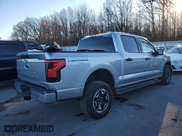 2023 Ford F-150 Lightning Pro z VIN 1FTVW1EL3PWG61686, wystawiony jako Copart lot #87870815 z przebiegiem Nie podano mil oraz Szkoda całkowita • Salvage title. Historia ofert i sprzedaży dostępna na DreamBid. Obrazek 3.