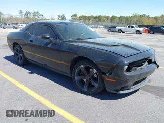 2015 Dodge Challenger SXT with VIN 2C3CDZAG0FH873869, listed as a IAAI auction lot 41760504 with 164,529 mi miles. Bid and sale history available at carsss.com. Image 1.