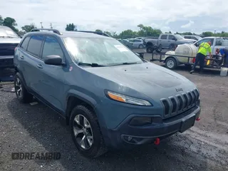 2014 Jeep Cherokee Trailhawk z VIN 1C4PJMBS4EW236950, wystawiony jako IAAI lot #42636128 z przebiegiem 170 491 mil mil oraz . Historia ofert i sprzedaży dostępna na DreamBid. Obrazek 1.