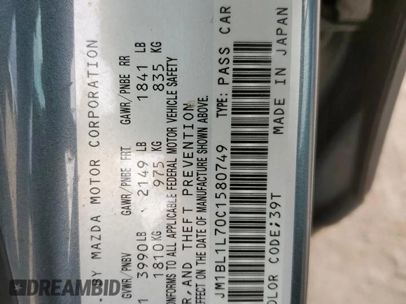 2012 Mazda 3 i Touring z VIN JM1BL1L70C1580749, wystawiony jako Copart lot #58774145 z przebiegiem 147 890 mil mil oraz Szkoda całkowita • Salvage title. Historia ofert i sprzedaży dostępna na DreamBid. Obrazek 13.