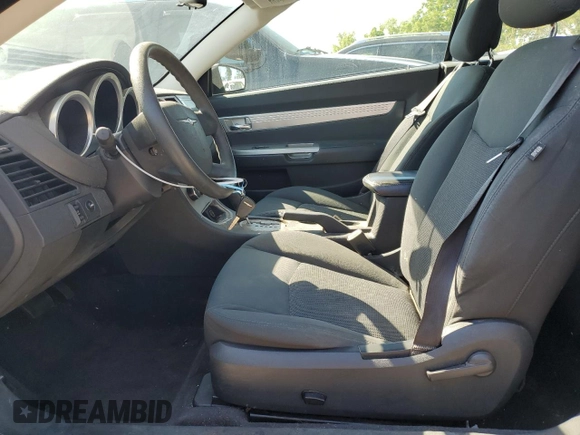 2010 Chrysler Sebring Touring z VIN 1C3BC5ED8AN166543, wystawiony jako Copart lot #56316984 z przebiegiem 78 655 mil mil oraz Szkoda całkowita • Salvage title. Historia ofert i sprzedaży dostępna na DreamBid. Obrazek 7.