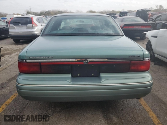 1997 Mercury Grand Marquis GS z VIN 2MELM74W7VX687221, wystawiony jako Copart lot #78665224 z przebiegiem 226 077 mil mil oraz Szkoda całkowita • Salvage title. Historia ofert i sprzedaży dostępna na DreamBid. Obrazek 6.