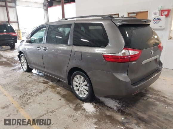 2015 Toyota Sienna Ltd with VIN 5TDDK3DC3FS106157, listed as a IAAI auction lot 41737202 with 173,724 mi miles. Bid and sale history available at carsss.com. Image 3.