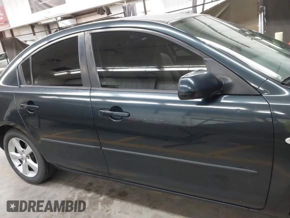 2006 Mazda 3 i Touring with VIN JM1BK32F061431107, listed as a IAAI auction lot 41792011 with 189,533 mi miles and . Bid and sale history available at DreamBid. Image 13.