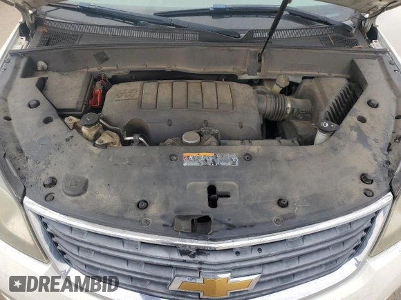 2014 Chevrolet Traverse LS z VIN 1GNKRFED5EJ340184, wystawiony jako Copart lot #54798975 z przebiegiem 197 728 mil mil oraz Czysty tytuł • Clean title. Historia ofert i sprzedaży dostępna na DreamBid. Obrazek 12.