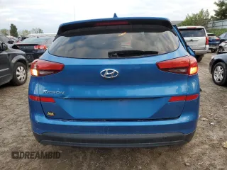 2019 Hyundai Tucson SE with VIN KM8J23A48KU845459, listed as a Copart auction lot 71819214 with 99,550 mi miles and Salvage Title. Bid and sale history available at carsss.com. Image 6.