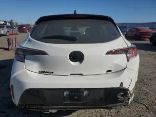 2022 Toyota Corolla Hatchback SE with VIN JTND4MBE6N3154350, listed as a Copart auction lot 77253914 with 6,854 mi miles and Salvage Title. Bid and sale history available at carsss.com. Image 6.