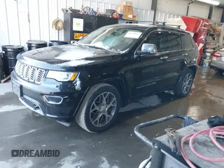 2020 Jeep Grand Cherokee Overland with VIN 1C4RJFCG6LC435298, listed as a IAAI auction lot 41378617 with 58,000 mi miles. Bid and sale history available at carsss.com. Image 17.