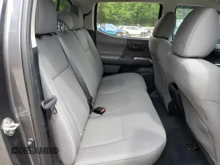 2018 Toyota Tacoma SR5 с VIN 5TFAZ5CN3JX071474, выставлен на аукционе Copart как лот 54677335 с пробегом 86 866 миль миль и Списание • Salvage title. История ставок и продаж доступна на DreamBid. Изображение 10.