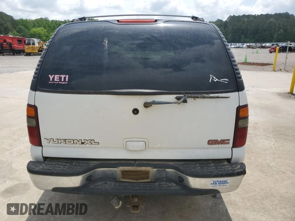 2002 GMC Yukon XL SLT z VIN 1GKFK16Z52J265501, wystawiony jako Copart lot #54234715 z przebiegiem 283 203 mil mil oraz Szkody całkowita. Historia ofert i sprzedaży dostępna na DreamBid. Obrazek 6.
