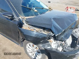 2012 Volkswagen Passat S z VIN 1VWAP7A3XCC003957, wystawiony jako IAAI lot #42416235 z przebiegiem 126 078 mil mil oraz . Historia ofert i sprzedaży dostępna na DreamBid. Obrazek 13.