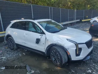 2024 Cadillac XT4 AWD Sport with VIN 1GYFZFR44RF195386, listed as a Copart auction lot 74949924 with 2,693 mi miles and Salvage title. Bid and sale history available at DreamBid. Image 4.