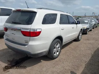 2011 Dodge Durango Crew with VIN 1D4RD4GG6BC730344, listed as a IAAI auction lot 42154714 with 211,903 mi miles and . Bid and sale history available at carsss.com. Image 4.