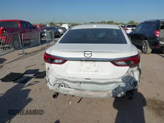 2016 Mazda Mazda6 i Grand Touring with VIN JM1GJ1W54G1456737, listed as a IAAI auction lot 41841001 with 114,870 mi miles. Bid and sale history available at carsss.com. Image 17.