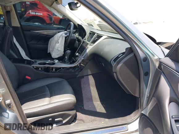 2015 Infiniti Q50 z VIN JN1BV7AP2FM357716, wystawiony jako IAAI lot #42504273 z przebiegiem 74 608 mil mil oraz . Historia ofert i sprzedaży dostępna na DreamBid. Obrazek 5.