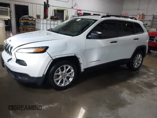 2016 Jeep Cherokee Sport z VIN 1C4PJLAB2GW291282, wystawiony jako IAAI lot #41579554 z przebiegiem 121 590 mil mil oraz . Historia ofert i sprzedaży dostępna na DreamBid. Obrazek 2.