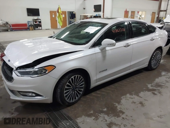 2018 Ford Fusion Titanium with VIN 3FA6P0RU1JR185937, listed as a IAAI auction lot 41863378 with 133,641 mi miles and . Bid and sale history available at DreamBid. Image 2.