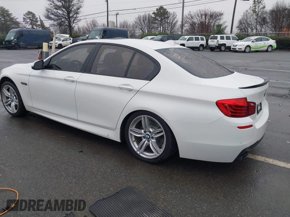 2014 BMW 5 Series 535d with VIN WBAXA5C58ED690612, listed as a IAAI auction lot 41570616 with 95,124 mi miles and . Bid and sale history available at carsss.com. Image 3.