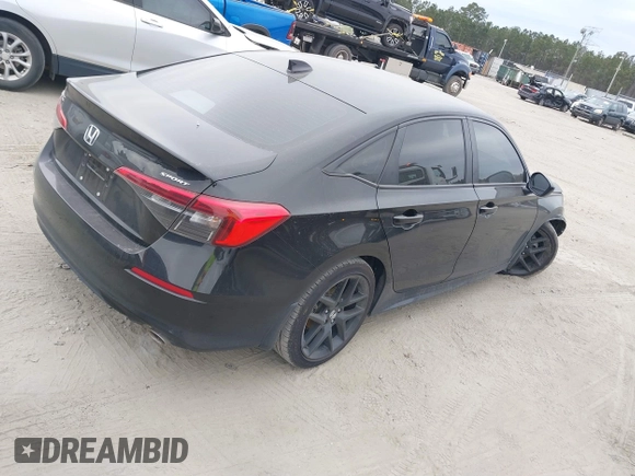 2024 Honda Civic Sport with VIN 2HGFE2F51RH594148, listed as a IAAI auction lot 41304184 with 11,307 mi miles and . Bid and sale history available at DreamBid. Image 4.
